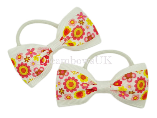 Pretty floral hair bows on thin bobbles 