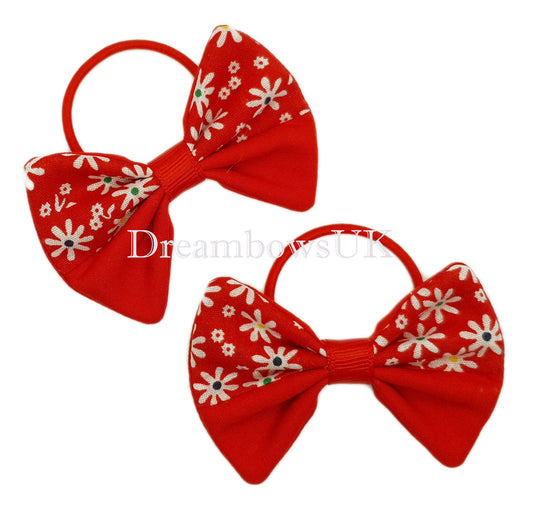 Red floral hair bows on thin bobbles