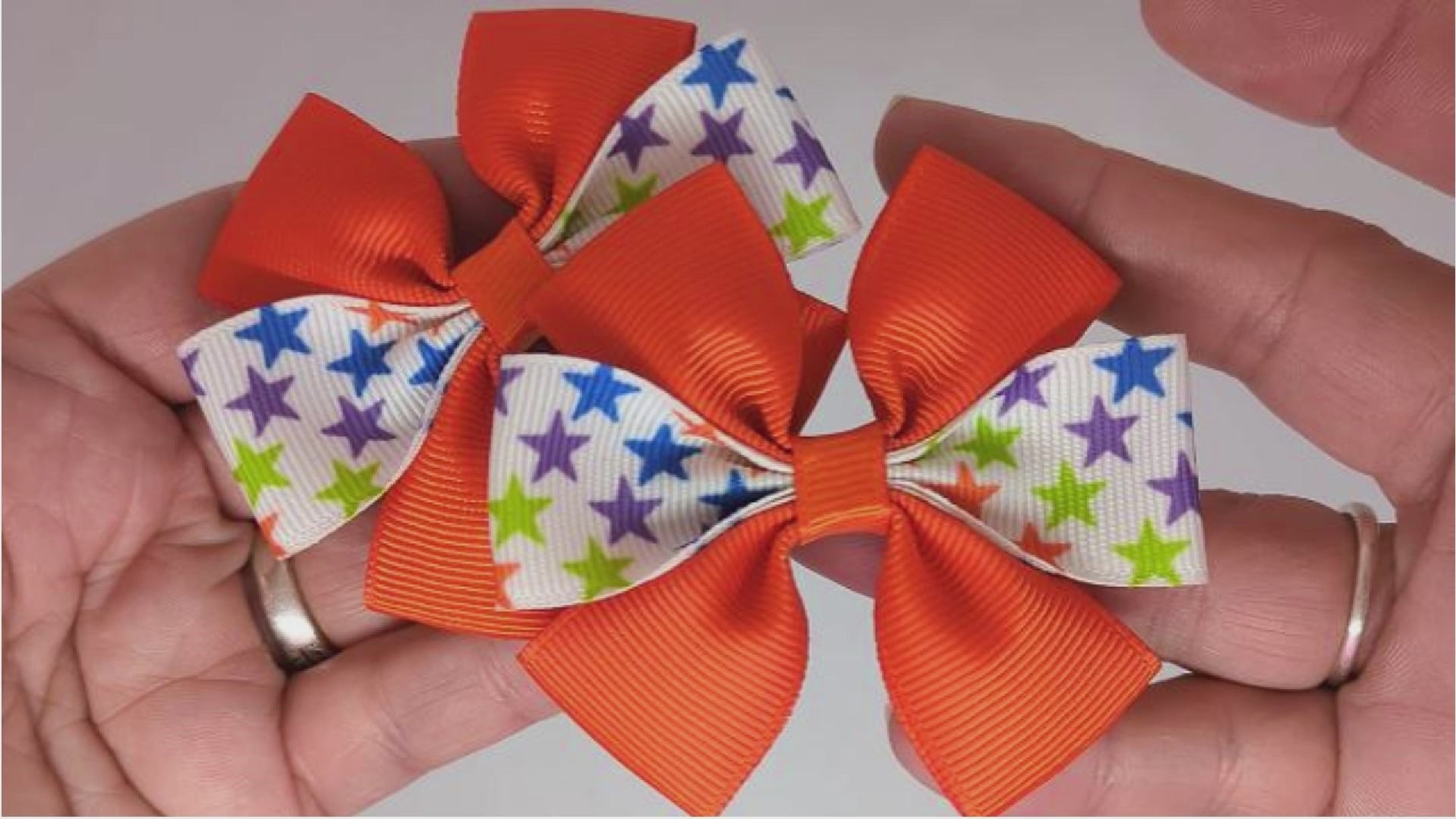 Orange and Colourful Stars Design Hair Bows on Alligator Clips – Grosgrain Ribbon, One-of-a-Kind